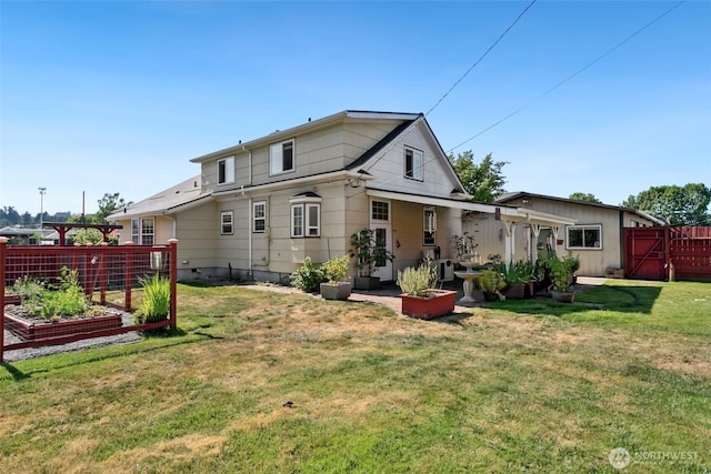 511 N Iron St, Centralia, WA 98531 - back of property with a garden and a gate
