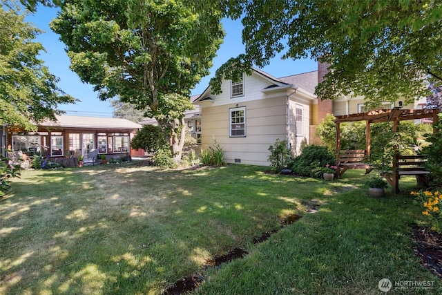 511 N Iron St, Centralia, WA 98531 - view of grassy yard featuring a pergola and a sunroom
