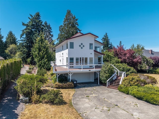 5225 Illahee Ln NE, Olympia, WA 98516 - view of front of property featuring concrete driveway, stairway, and an attached garage