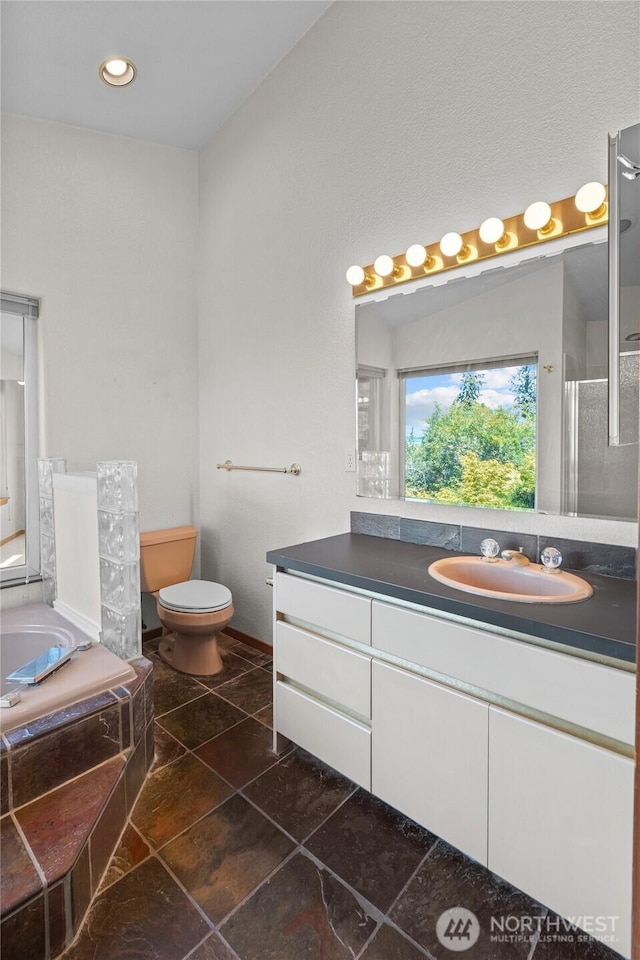 5225 Illahee Ln NE, Olympia, WA 98516 - full bathroom with vanity, a bath, a shower with door, tile patterned flooring, and recessed lighting