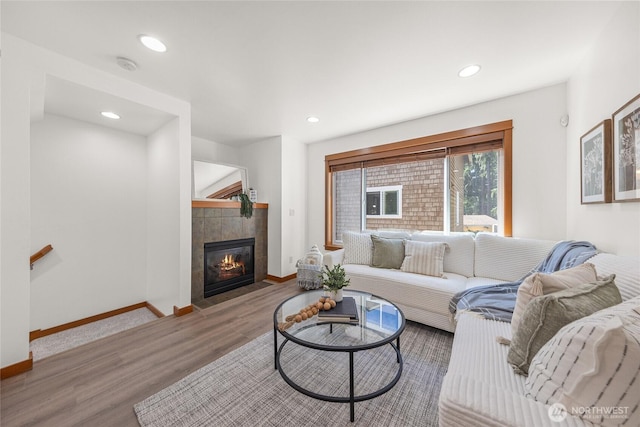 2511 NE 125th St Unit A, Seattle, WA 98125 - living area featuring wood finished floors, a tile fireplace, and recessed lighting