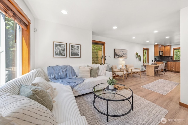 2511 NE 125th St Unit A, Seattle, WA 98125 - living area with healthy amount of natural light, recessed lighting, and light wood-style floors