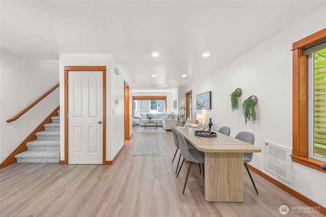 2511 NE 125th St Unit A, Seattle, WA 98125 - dining room featuring light wood finished floors, stairs, recessed lighting, and radiator