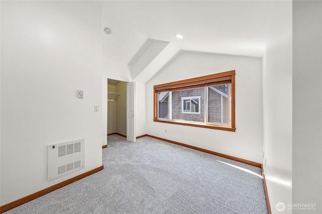 2511 NE 125th St Unit A, Seattle, WA 98125 - spare room featuring carpet floors, vaulted ceiling, and recessed lighting