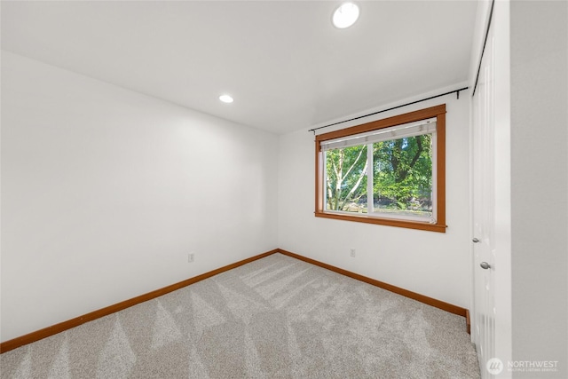 2511 NE 125th St Unit A, Seattle, WA 98125 - carpeted empty room featuring baseboards and recessed lighting