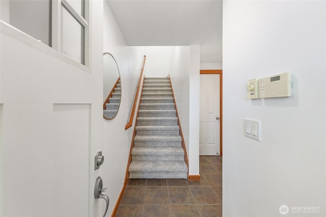 2511 NE 125th St Unit A, Seattle, WA 98125 - stairway with baseboards and tile patterned flooring