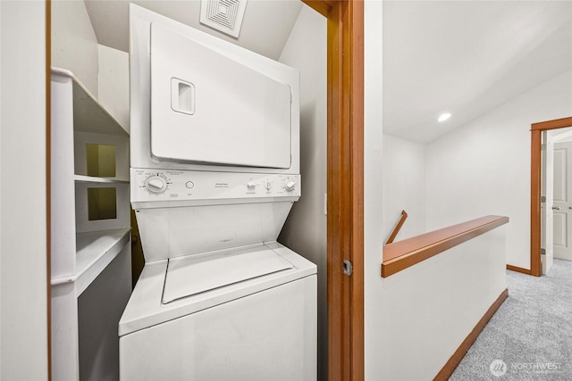 2511 NE 125th St Unit A, Seattle, WA 98125 - washroom with stacked washer / drying machine and light colored carpet
