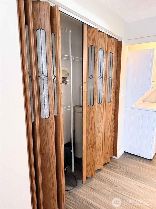 598 Blue Wing Loop SE, Ocean Shores, WA 98569 - hallway featuring light wood finished floors