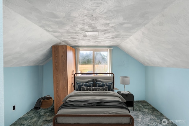 2507 Bay Ave, Hoquiam, WA 98550 - carpeted bedroom with vaulted ceiling and a textured ceiling
