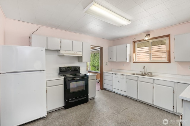 2507 Bay Ave, Hoquiam, WA 98550 - kitchen featuring white appliances, light countertops, under cabinet range hood, and white cabinetry