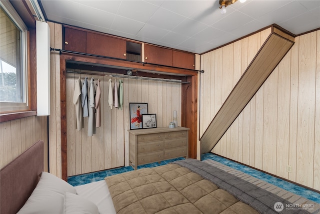 2507 Bay Ave, Hoquiam, WA 98550 - bedroom featuring wooden walls and carpet