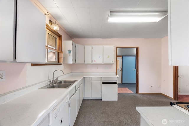 2507 Bay Ave, Hoquiam, WA 98550 - kitchen with light countertops, white cabinetry, carpet, and dishwasher