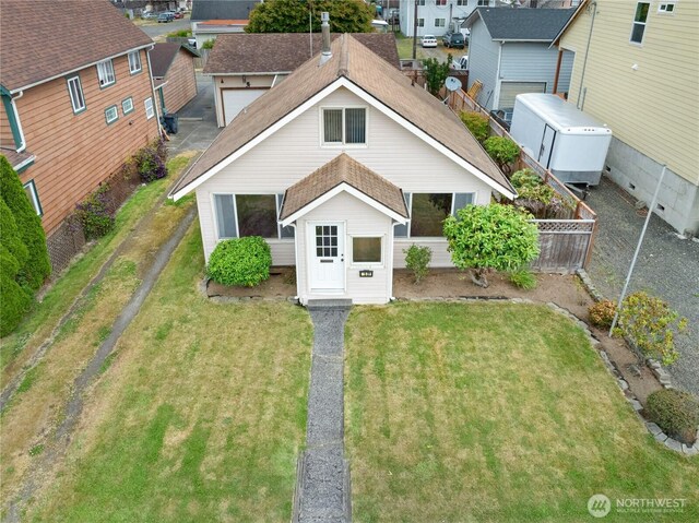 2507 Bay Ave, Hoquiam, WA 98550 - traditional-style house featuring a fenced backyard and a residential view