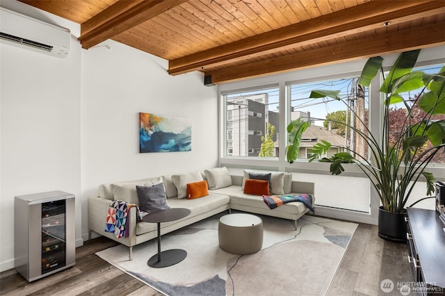 917 NW 51st St Unit D, Seattle, WA 98107 - living area with wine cooler, a wooden ceiling with exposed beams, a wall unit AC, and wood finished floors