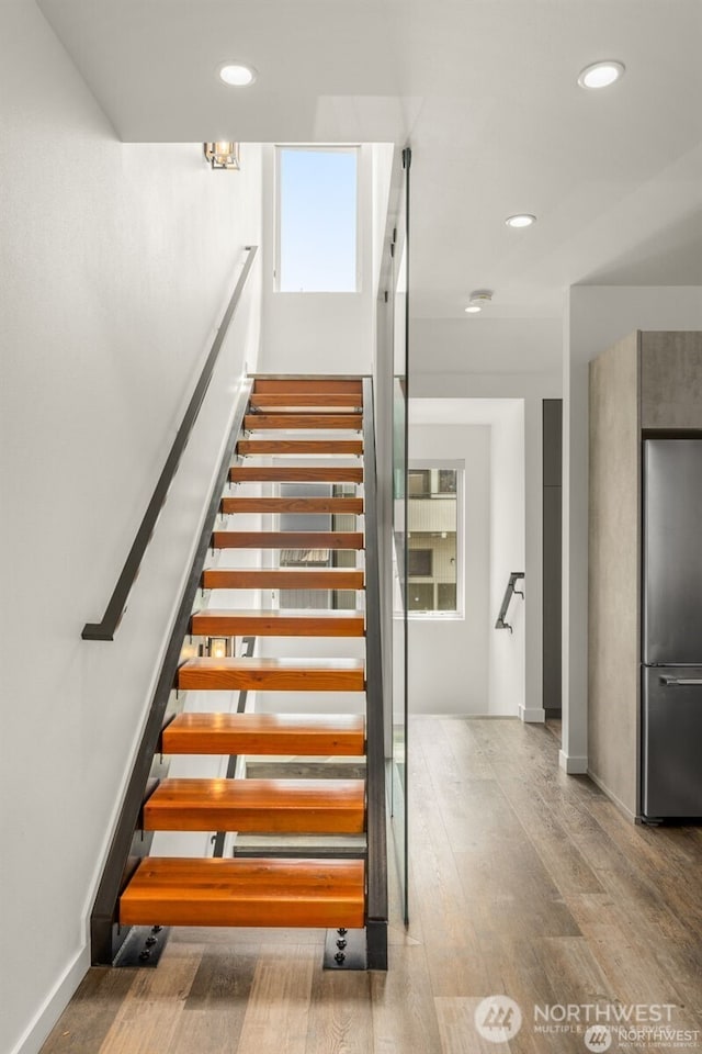 917 NW 51st St Unit D, Seattle, WA 98107 - stairs with wood finished floors and recessed lighting
