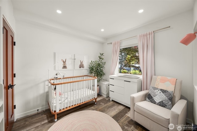 917 NW 51st St Unit D, Seattle, WA 98107 - bedroom featuring wood finished floors, recessed lighting, and a nursery area