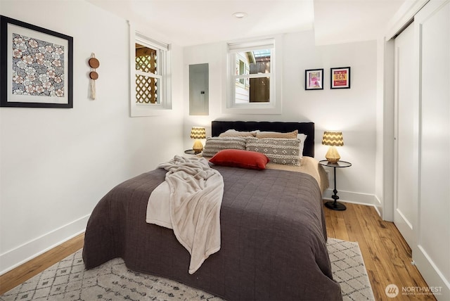 3033 48th Ave SW, Seattle, WA 98116 - bedroom with electric panel and light wood finished floors