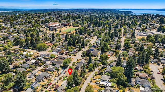 3033 48th Ave SW, Seattle, WA 98116 - aerial overview of property's location with a large body of water and nearby suburban area