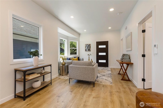 5310 46th Ave S, Seattle, WA 98118 - living area with light wood-style flooring and recessed lighting