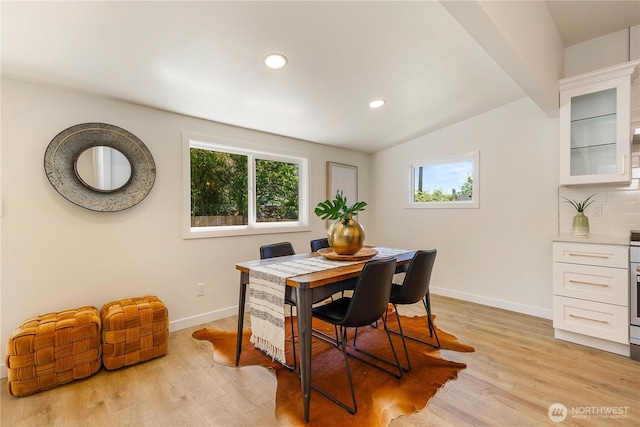 5310 46th Ave S, Seattle, WA 98118 - dining room featuring healthy amount of natural light, light wood-style floors, recessed lighting, and lofted ceiling