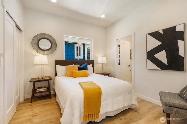 5310 46th Ave S, Seattle, WA 98118 - bedroom with wood finished floors, recessed lighting, and a closet