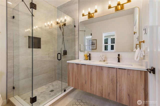 5310 46th Ave S, Seattle, WA 98118 - bathroom with double vanity, a shower stall, and tile patterned floors