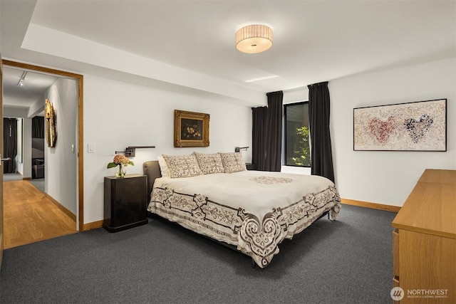 3650 26th Pl W Unit 202A, Seattle, WA 98199 - carpeted bedroom featuring baseboards