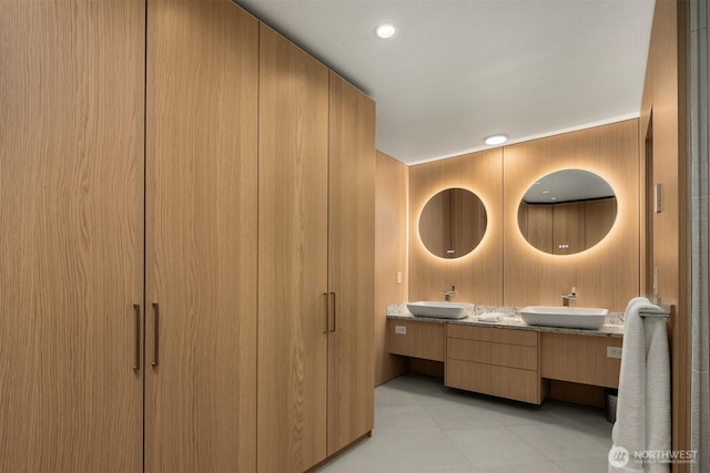 3650 26th Pl W Unit 202A, Seattle, WA 98199 - full bathroom featuring double vanity and tile patterned floors