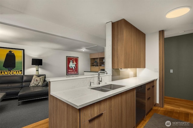 3650 26th Pl W Unit 202A, Seattle, WA 98199 - kitchen featuring modern cabinets, light wood-style floors, and light countertops