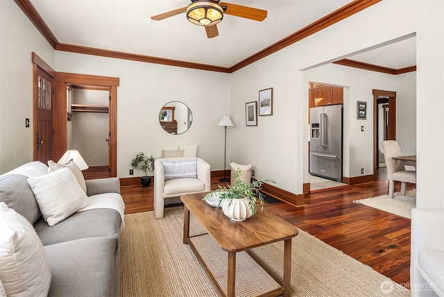 5817 28th Ave NW, Seattle, WA 98107 - living room with light wood-type flooring, a ceiling fan, and crown molding