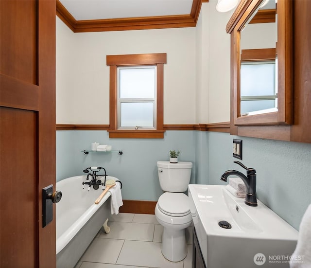 5817 28th Ave NW, Seattle, WA 98107 - bathroom featuring a bath, plenty of natural light, tile patterned floors, vanity, and ornamental molding