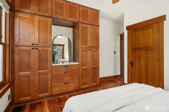 5817 28th Ave NW, Seattle, WA 98107 - bedroom featuring dark wood-type flooring and a closet