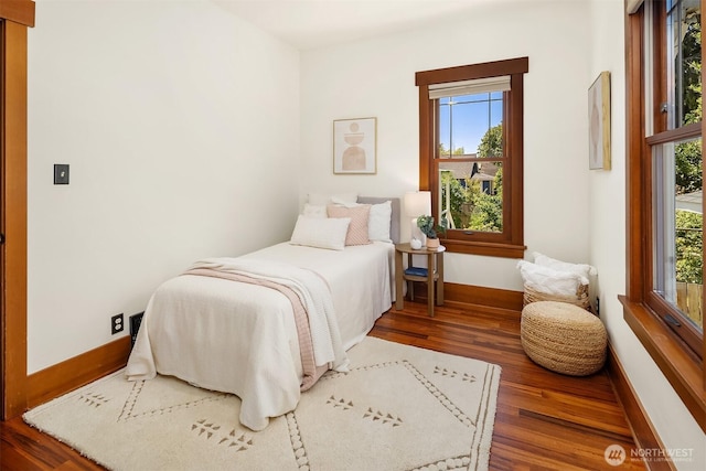 5817 28th Ave NW, Seattle, WA 98107 - bedroom with wood finished floors and multiple windows