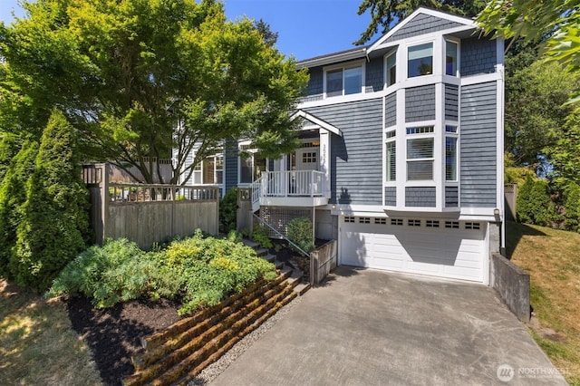 3055 49th Ave SW, Seattle, WA 98116 - view of front of property with an attached garage and driveway