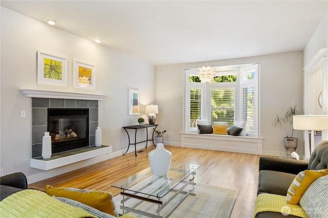 3055 49th Ave SW, Seattle, WA 98116 - living area featuring a fireplace and wood finished floors