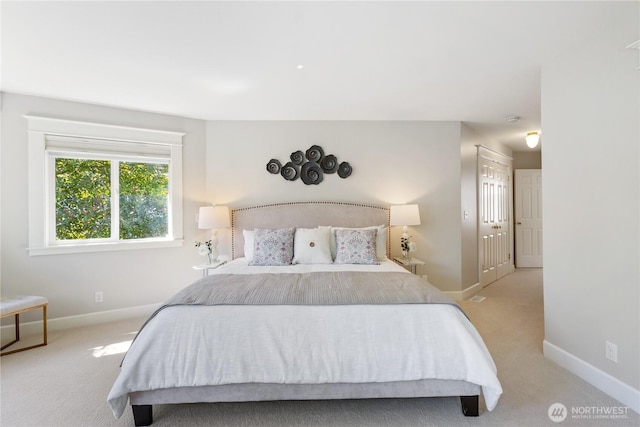 3055 49th Ave SW, Seattle, WA 98116 - bedroom featuring baseboards and carpet