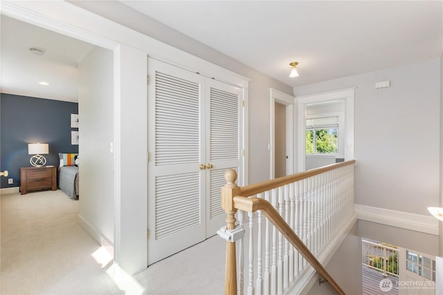 3055 49th Ave SW, Seattle, WA 98116 - corridor with an upstairs landing and light carpet