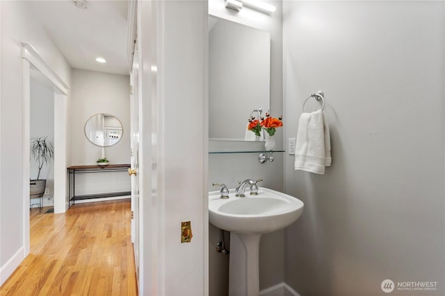 3055 49th Ave SW, Seattle, WA 98116 - bathroom featuring wood finished floors and recessed lighting