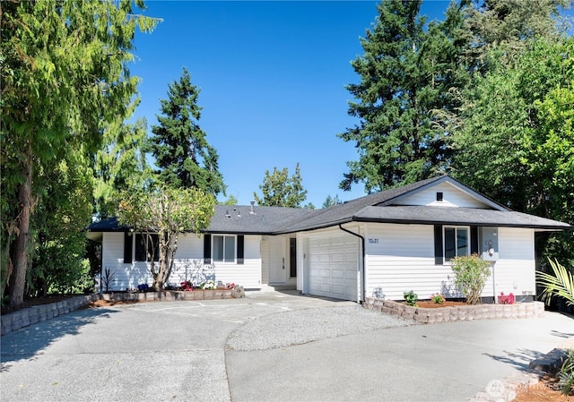12621 SE 166th St, Renton, WA 98058 - ranch-style home featuring an attached garage, driveway, and a shingled roof