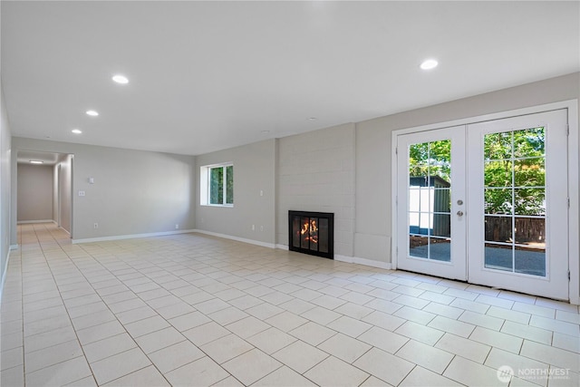 12621 SE 166th St, Renton, WA 98058 - unfurnished living room with recessed lighting, a fireplace, french doors, and light tile patterned flooring