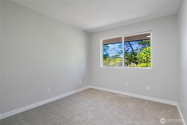 12621 SE 166th St, Renton, WA 98058 - carpeted empty room featuring baseboards