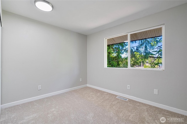 12621 SE 166th St, Renton, WA 98058 - spare room featuring carpet and baseboards