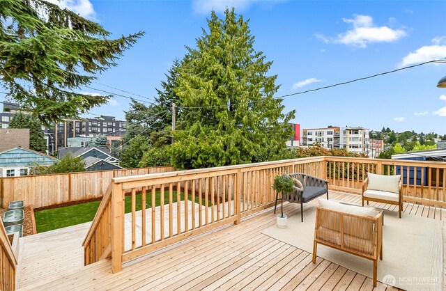 4725 37th Ave SW, Seattle, WA 98126 - deck featuring a fenced backyard and outdoor lounge area