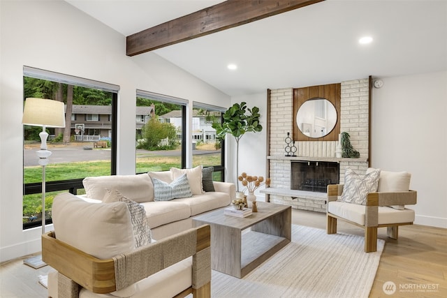 14821 117th Pl NE, Kirkland, WA 98034 - living area with light wood-style floors, a brick fireplace, and recessed lighting