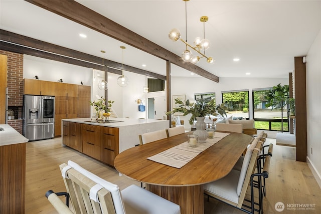14821 117th Pl NE, Kirkland, WA 98034 - dining space featuring light wood-style floors, beam ceiling, recessed lighting, and a chandelier