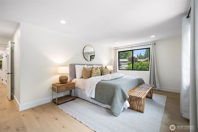 14821 117th Pl NE, Kirkland, WA 98034 - bedroom with light wood-type flooring and recessed lighting