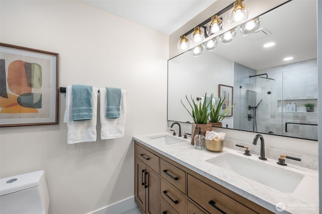 14821 117th Pl NE, Kirkland, WA 98034 - bathroom featuring double vanity, a tile shower, and recessed lighting