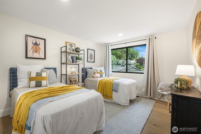 14821 117th Pl NE, Kirkland, WA 98034 - bedroom with wood finished floors and recessed lighting