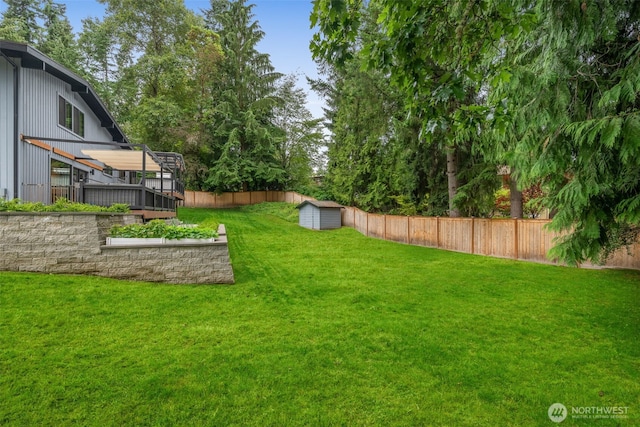 14821 117th Pl NE, Kirkland, WA 98034 - fenced backyard featuring a storage unit