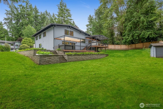 14821 117th Pl NE, Kirkland, WA 98034 - back of property with stairs, a deck, and a shed